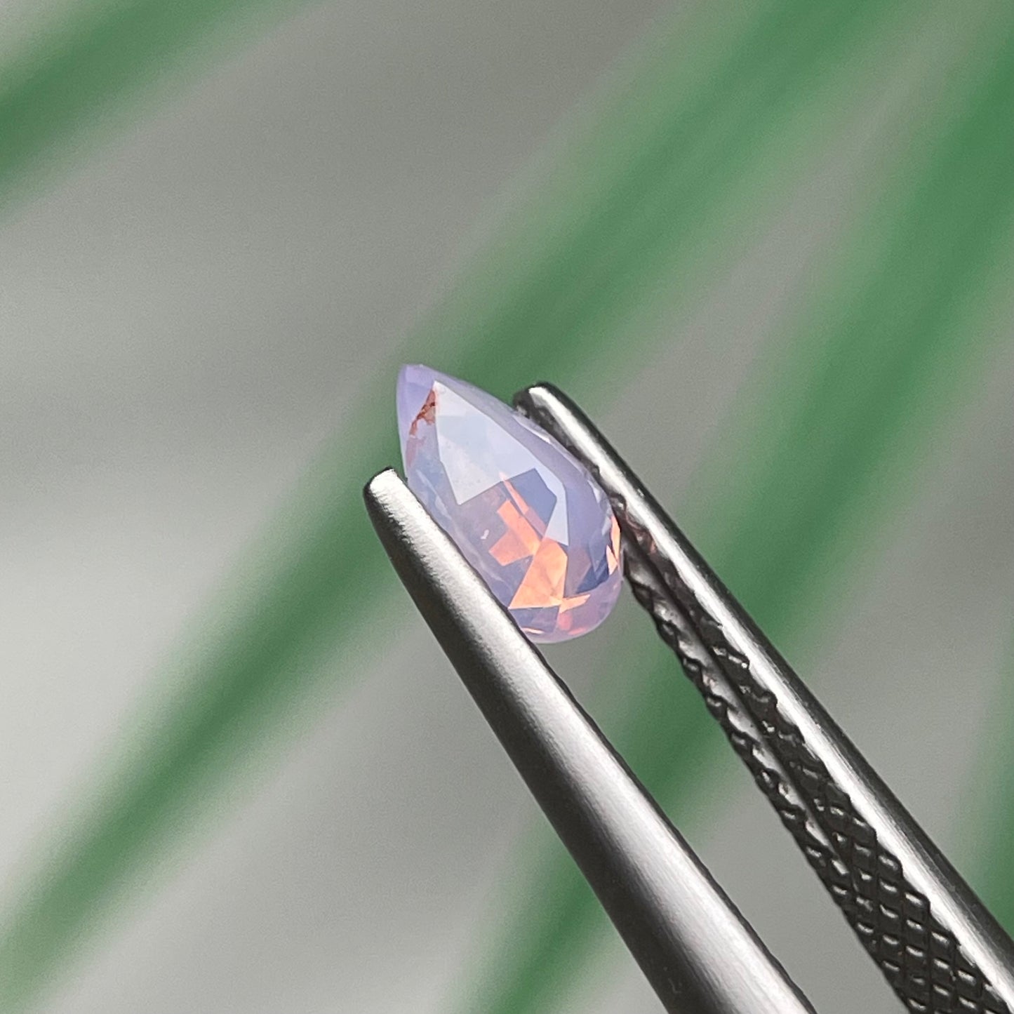 0.48ct Natural Milky Light Orangish Purple Sapphire Vietnam