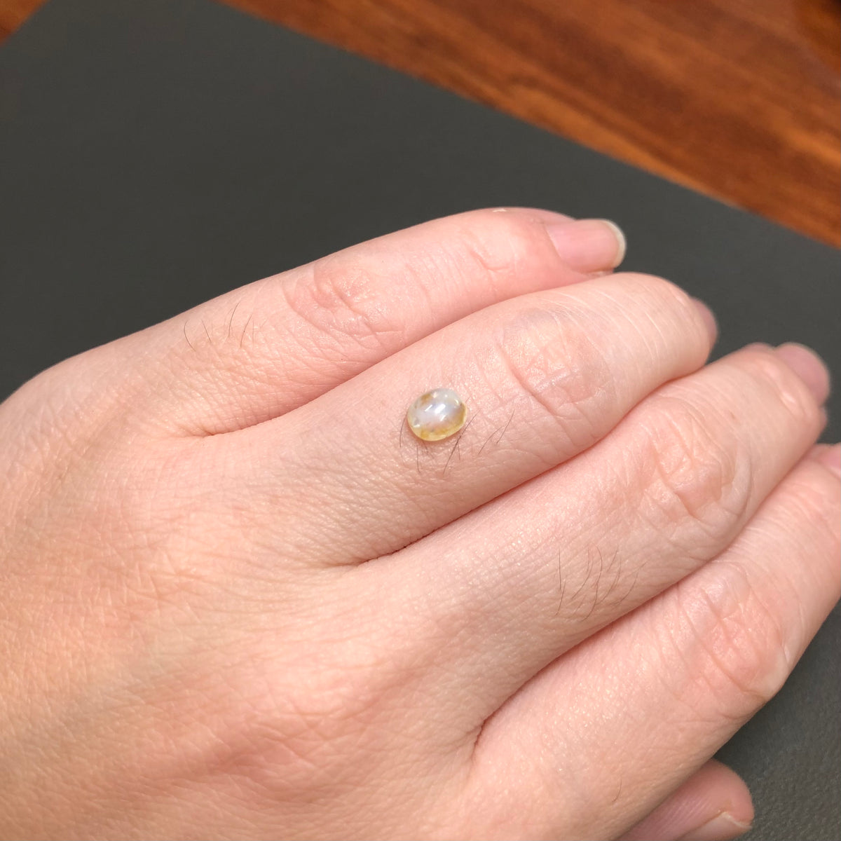 0,75ct Natural Yellowish White Cacbochon Sapphire Viet Nam. No Treatment Sapphire Luc Yen.