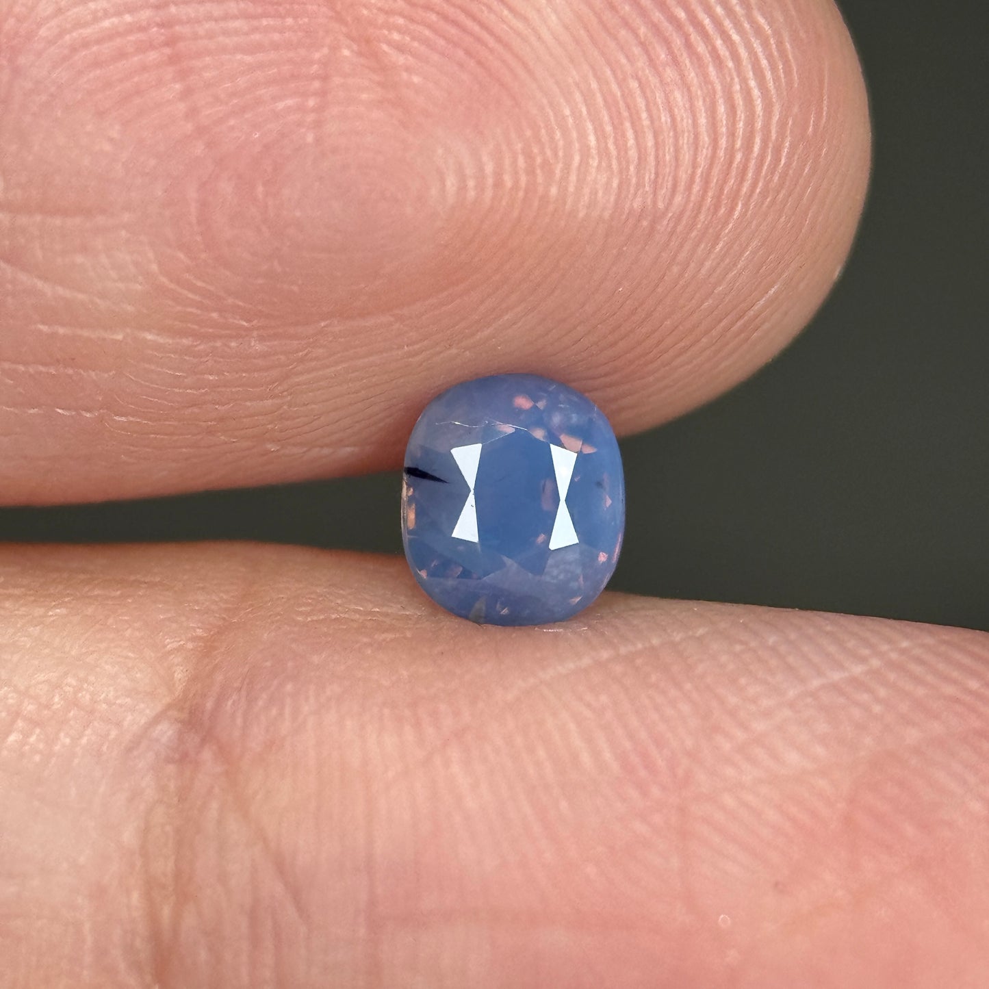 0.83ct Natural Purplish Blue Milky Sapphire Vietnam. Cushion Shape. No Treatment.