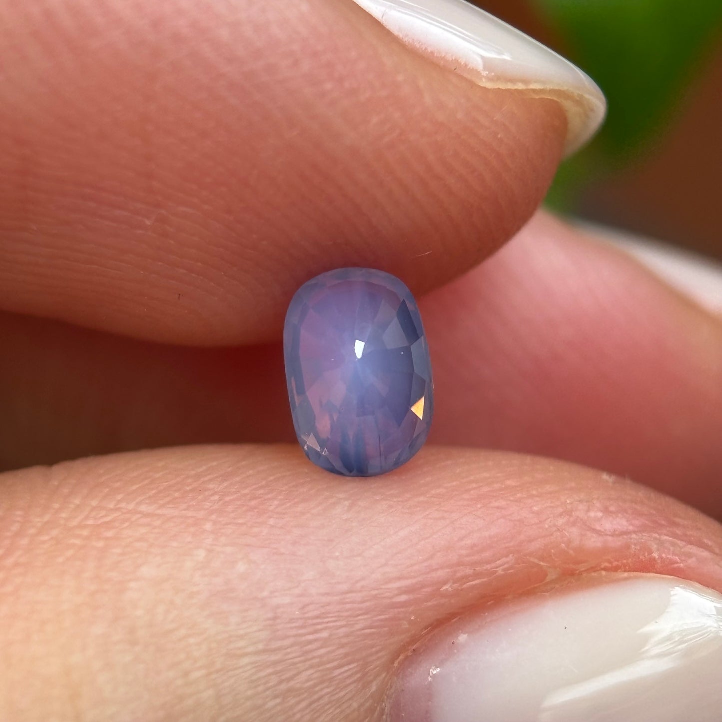 0.66 ct Natural Pinkish Purple Milky Sapphire Vietnam. Cushion Shape. No Treatment.