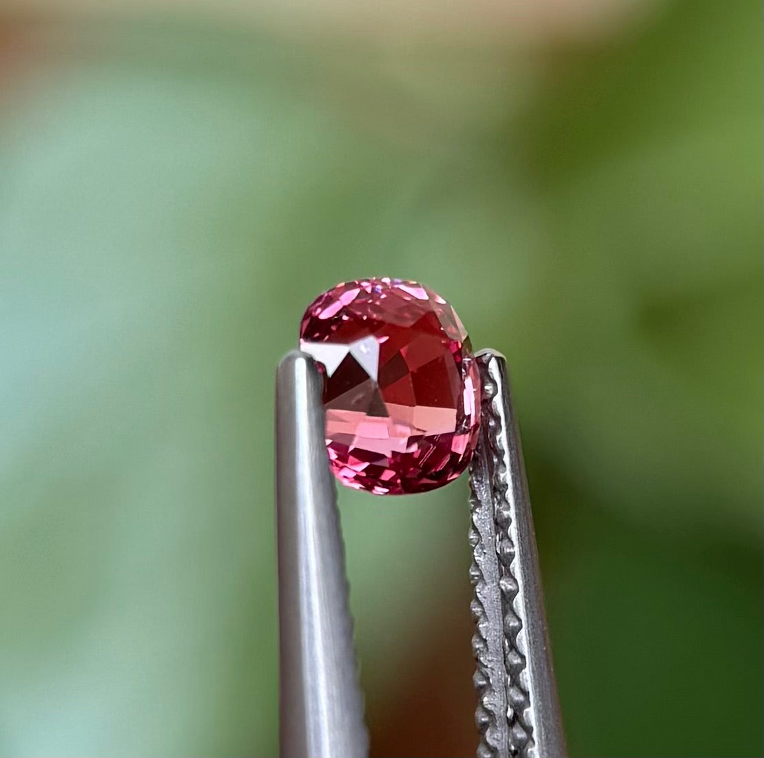 0.73ct Natural Pink-Orange Spinel Vietnam. Cushion Shape.