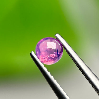 0.57ct Natural Purplish Pink Cacbochon Sapphire Viet Nam. No treatment.