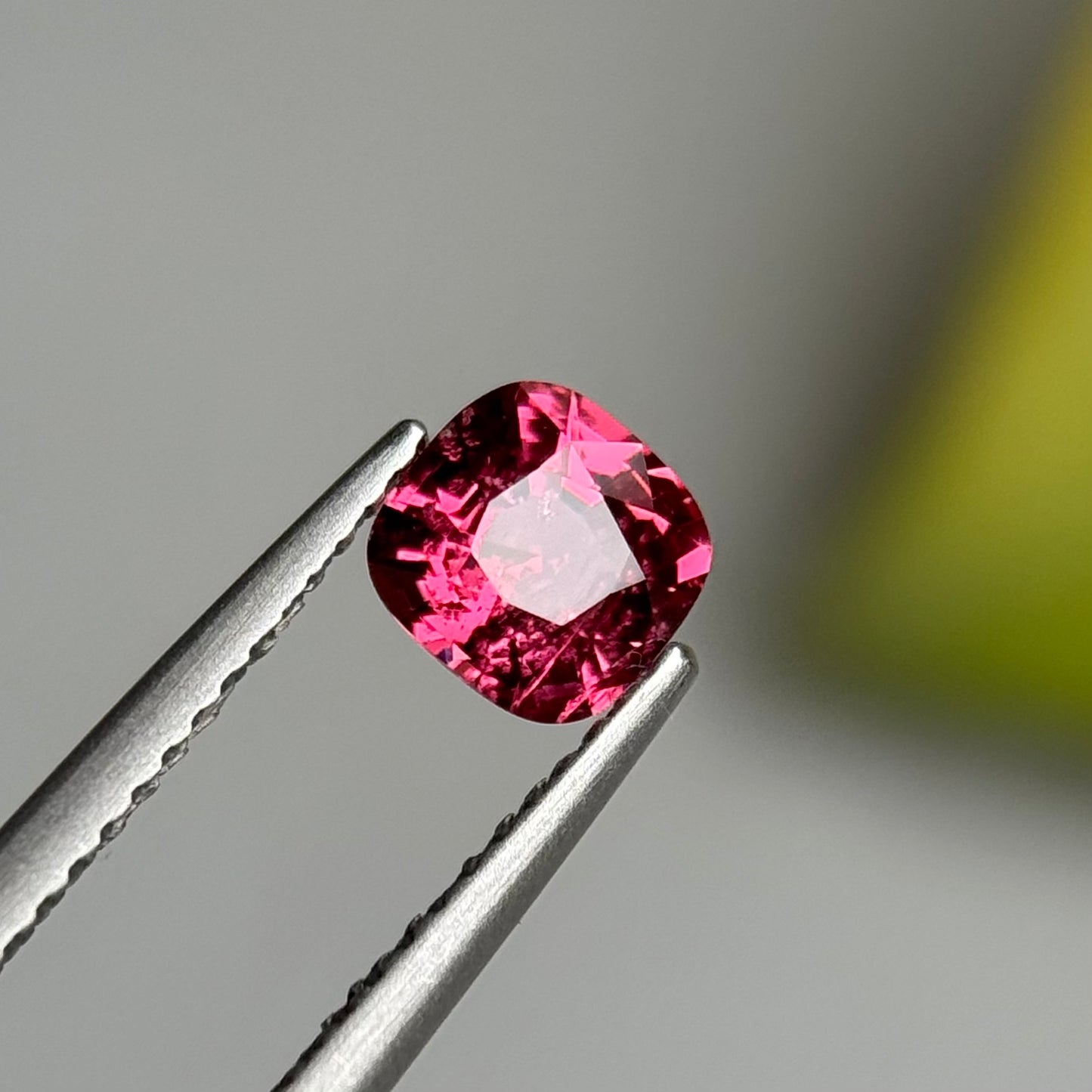 0.79 ct Natural Orangish Pink Spinel Vietnam. Cushion Shape.