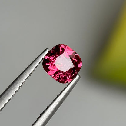 0.79 ct Natural Orangish Pink Spinel Vietnam. Cushion Shape.