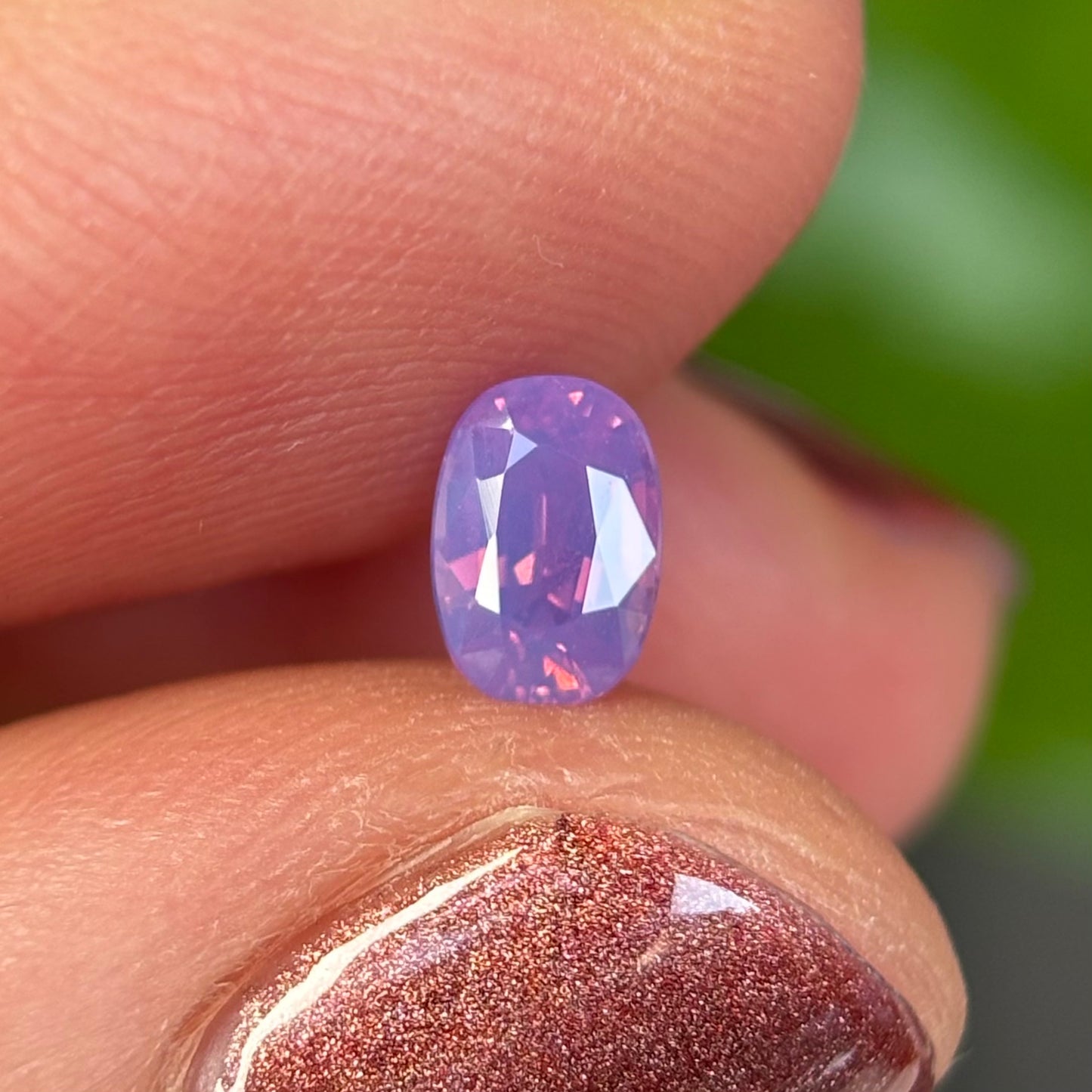 0.50 ct Natural Pinkish Purple Milky Sapphire Vietnam. Oval Shape. No Treatment.