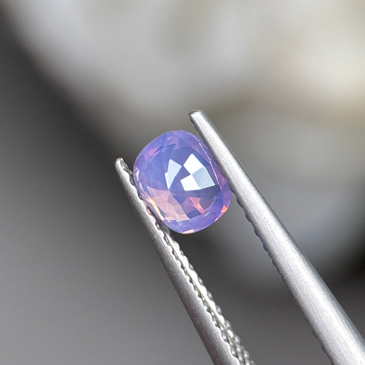 0,55ct Natural Pinkish Purple Milky Sapphire Vietnam. Cushion Shape. No Treatment Milky Sapphire Luc Yen.