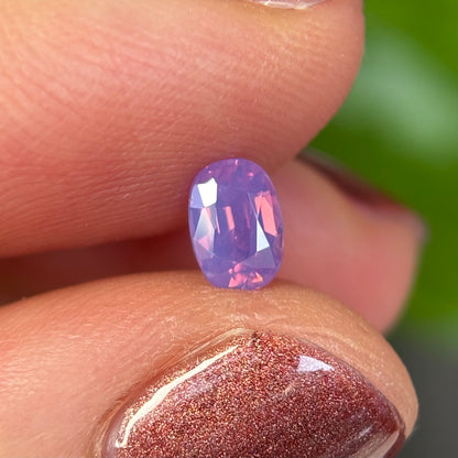 0.50 ct Natural Pinkish Purple Milky Sapphire Vietnam. Oval Shape. No Treatment.