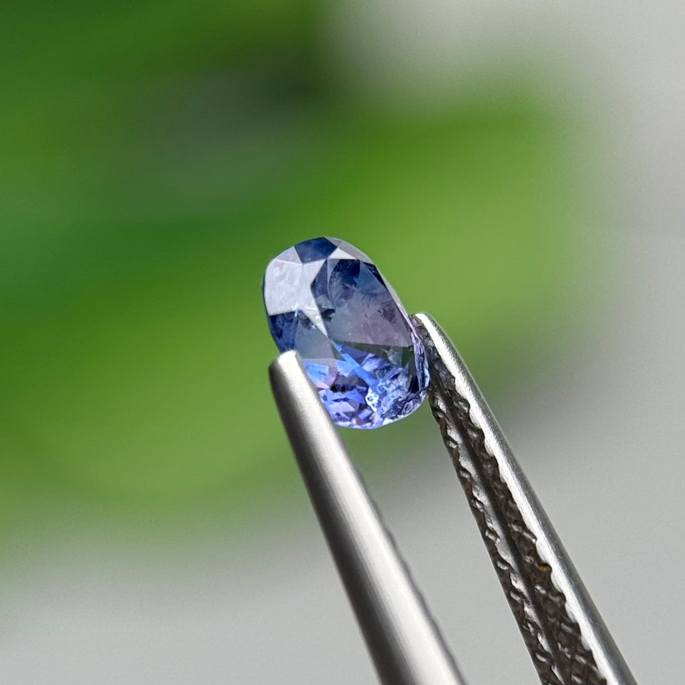0.57 ct Natural Purplish Blue Milky Sapphire Vietnam. Cushion Shape. No Treatment.