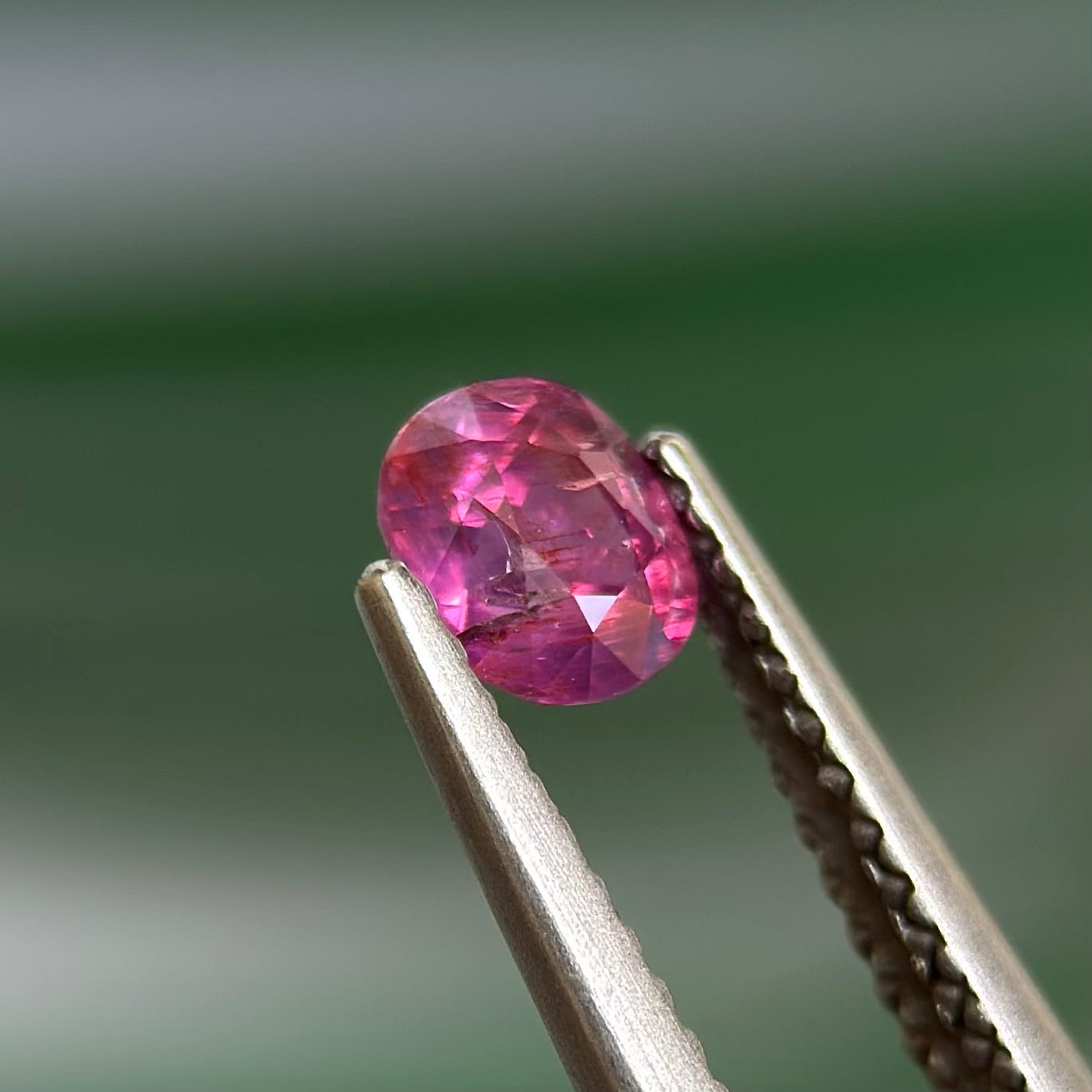 0.59 ct Natural Prurplish Pink Sapphire Vietnam. Cushion Shape. No Treatment.