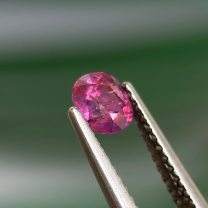 0.59 ct Natural Prurplish Pink Sapphire Vietnam. Cushion Shape. No Treatment.