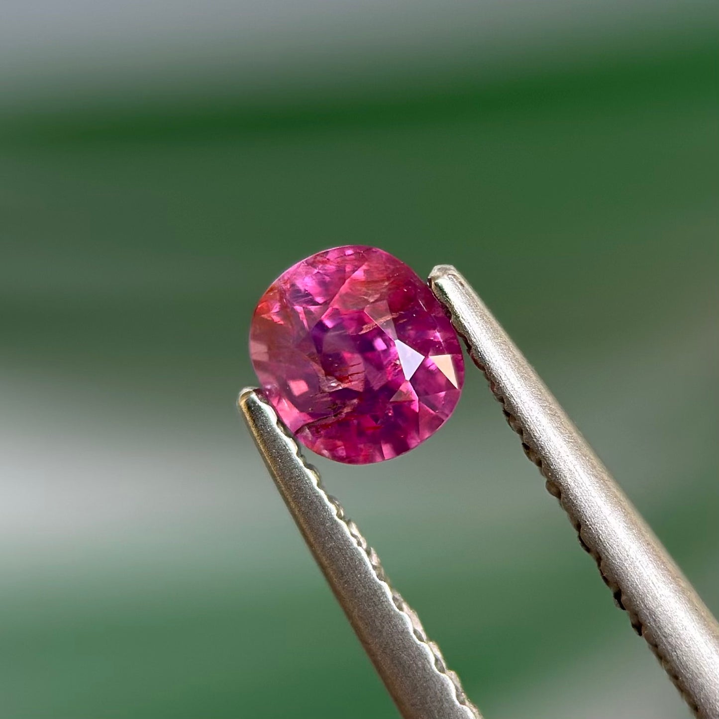 0.59 ct Natural Prurplish Pink Sapphire Vietnam. Cushion Shape. No Treatment.