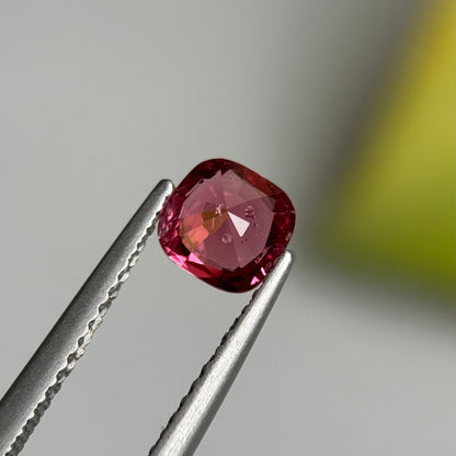 0.79 ct Natural Orangish Pink Spinel Vietnam. Cushion Shape.