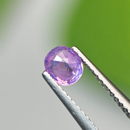 0.58 ct Natural Pinkish Purple Milky Sapphire Vietnam. Cushion Shape. No Treatment.