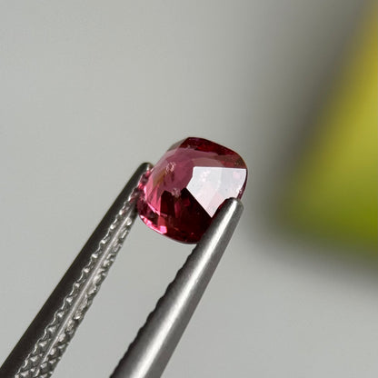 0.79 ct Natural Orangish Pink Spinel Vietnam. Cushion Shape.