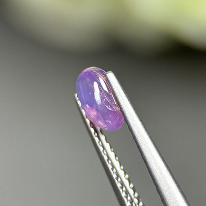 0.64ct Natural Pinkish Purple Cacbochon Sapphire Viet Nam. No treatment.