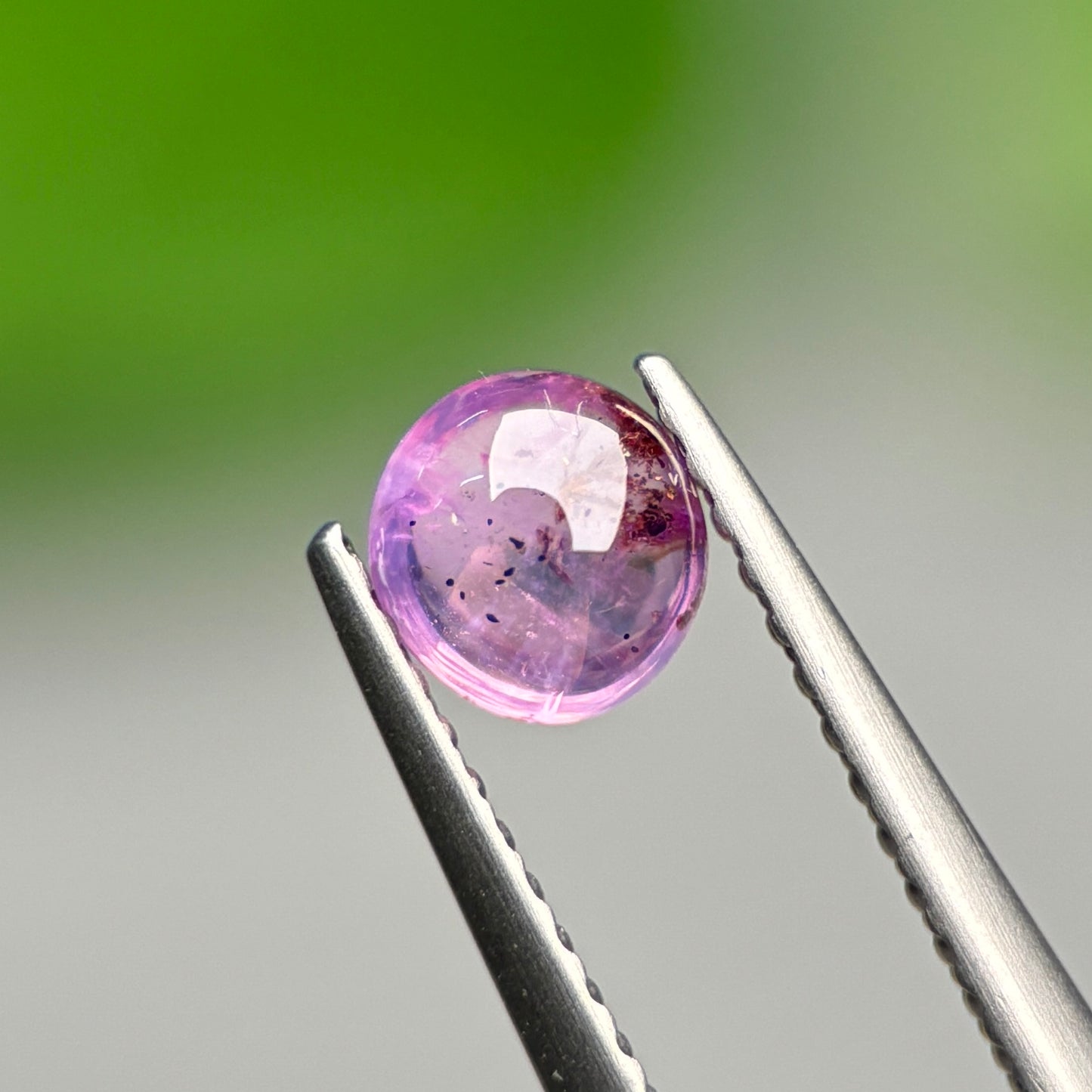 0.68ct Natural Pinkish Purple Cacbochon Sapphire Viet Nam. No treatment Sapphire Luc Yen.