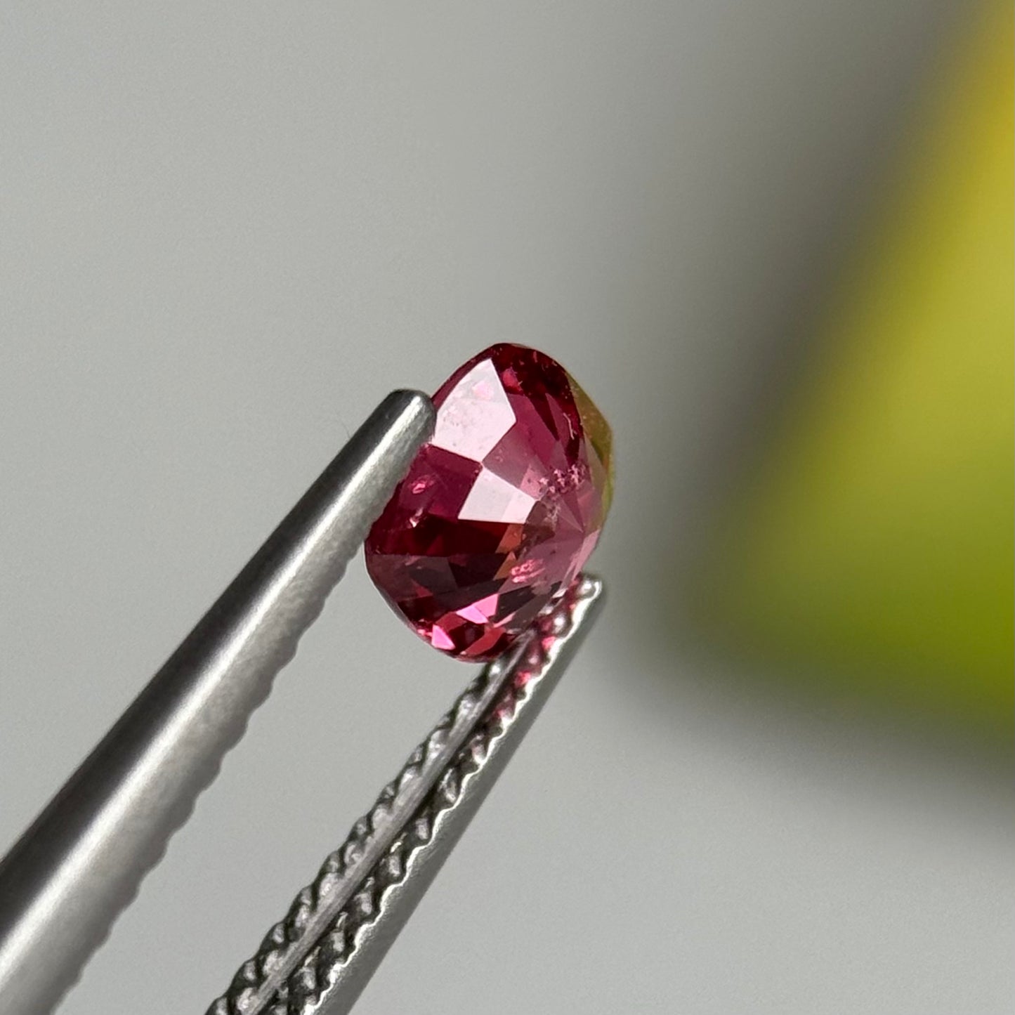 0.79 ct Natural Orangish Pink Spinel Vietnam. Cushion Shape.