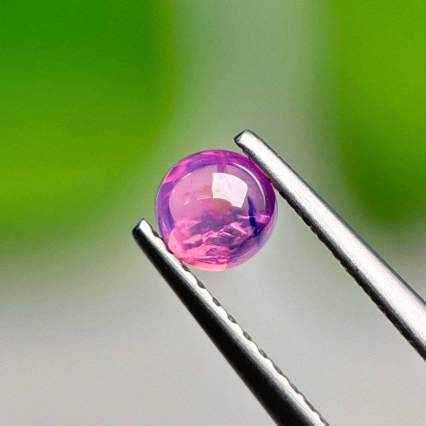 0.57ct Natural Purplish Pink Cacbochon Sapphire Viet Nam. No treatment.