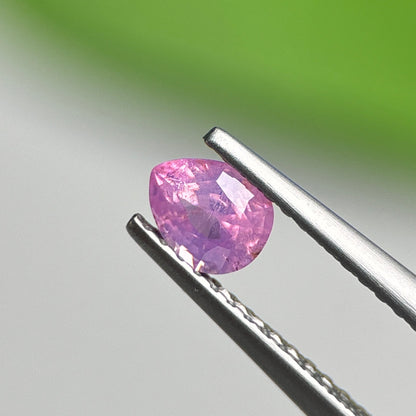 0.48 ct Natural Purplish Pink Milky Sapphire Vietnam. Pear Shape. No treatment.