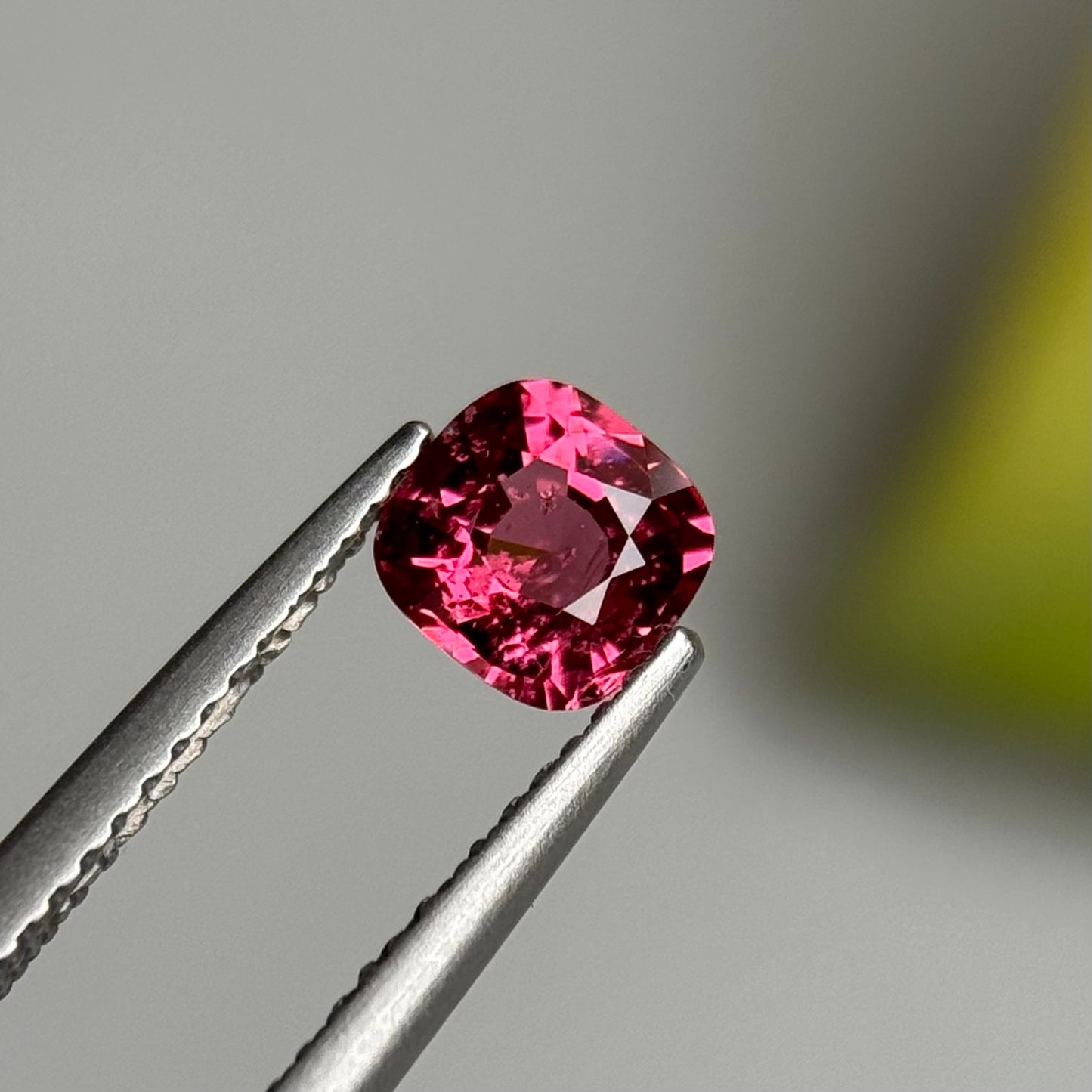 0.79 ct Natural Orangish Pink Spinel Vietnam. Cushion Shape.
