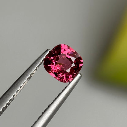 0.79 ct Natural Orangish Pink Spinel Vietnam. Cushion Shape.