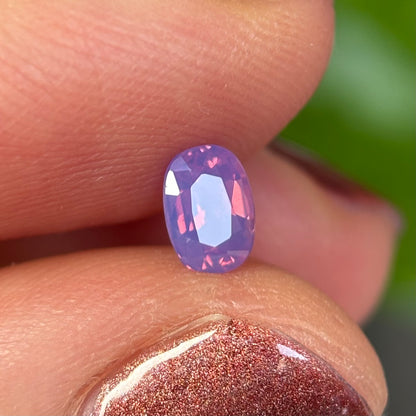 0.50 ct Natural Pinkish Purple Milky Sapphire Vietnam. Oval Shape. No Treatment.