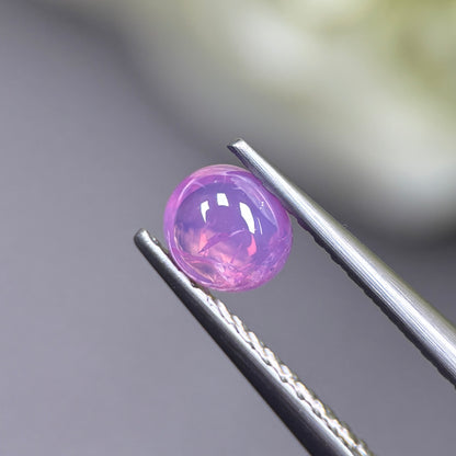 0.59ct Natural Purplish Pink Cacbochon Sapphire Viet Nam. No treatment.