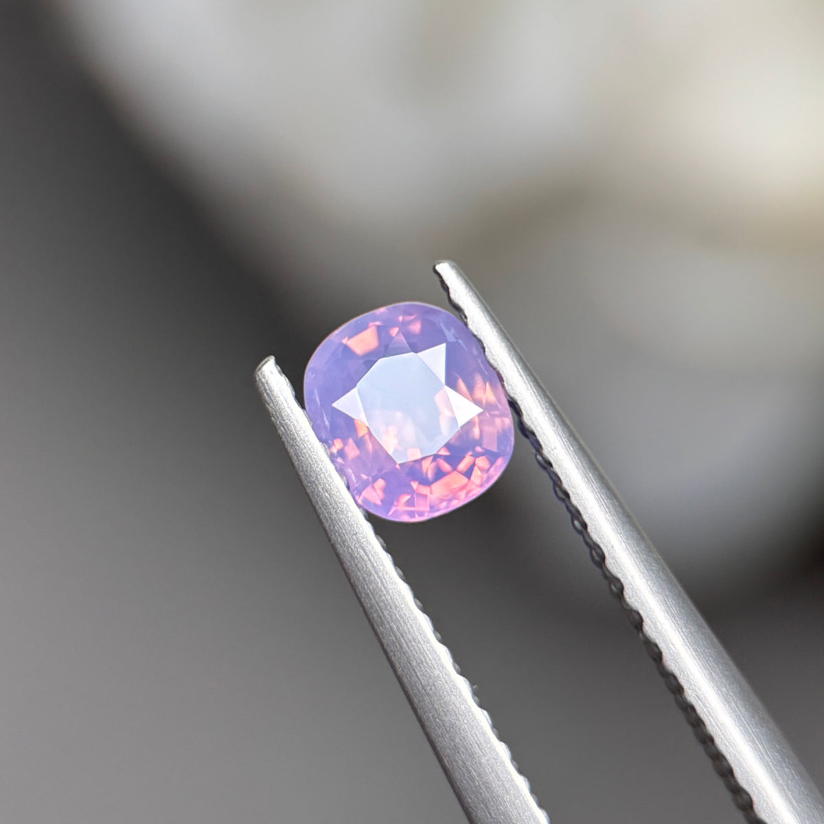 0,55ct Natural Pinkish Purple Milky Sapphire Vietnam. Cushion Shape. No Treatment Milky Sapphire Luc Yen.