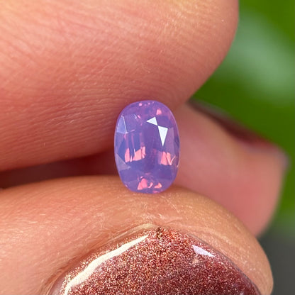0.50 ct Natural Pinkish Purple Milky Sapphire Vietnam. Oval Shape. No Treatment.