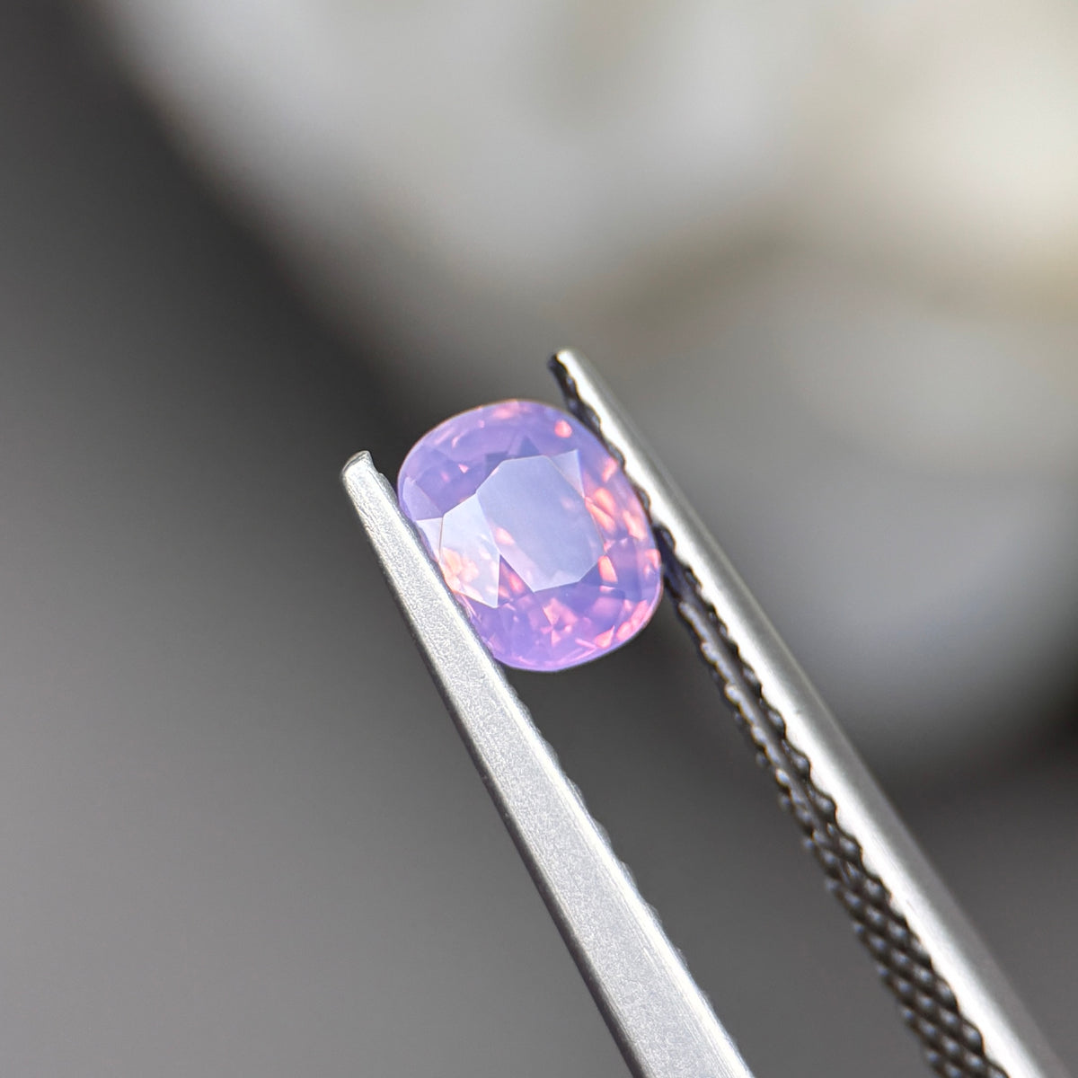 0,55ct Natural Pinkish Purple Milky Sapphire Vietnam. Cushion Shape. No Treatment Milky Sapphire Luc Yen.