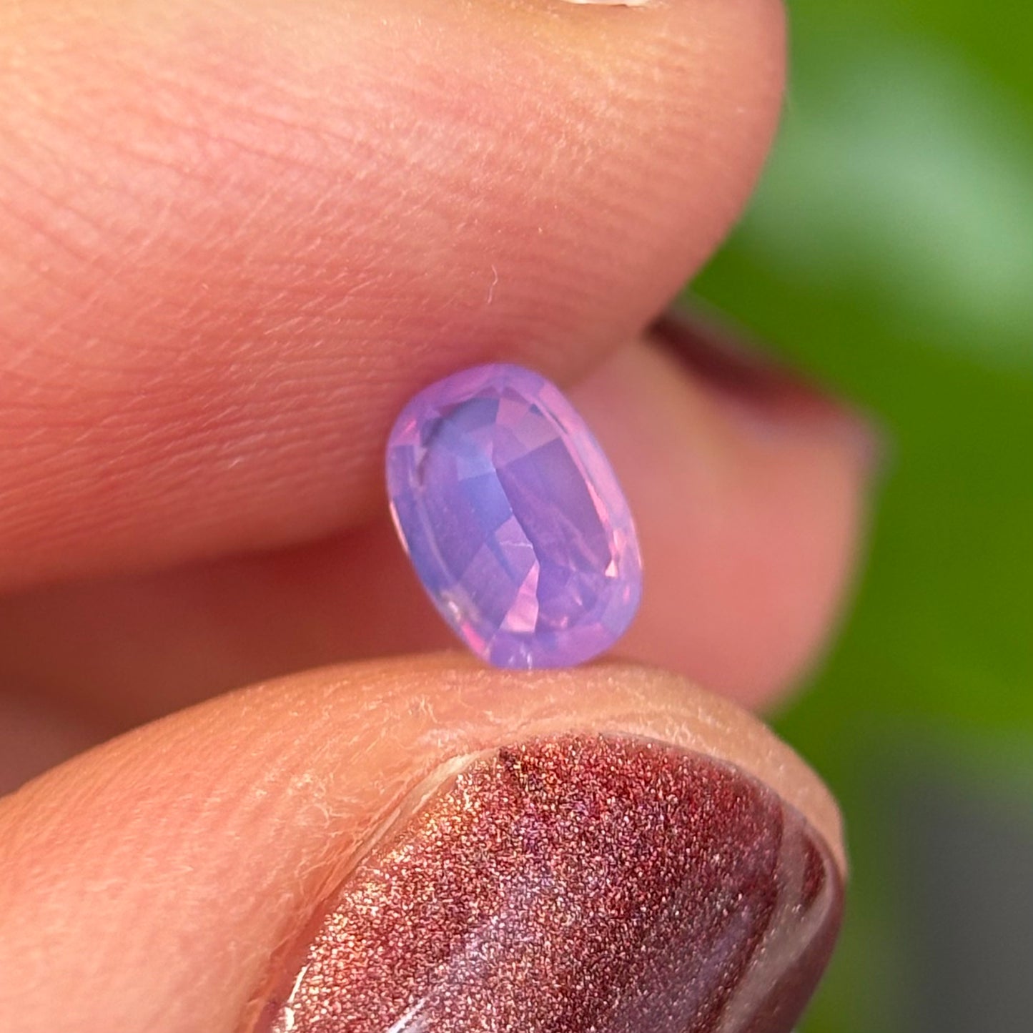 0.50 ct Natural Pinkish Purple Milky Sapphire Vietnam. Oval Shape. No Treatment.