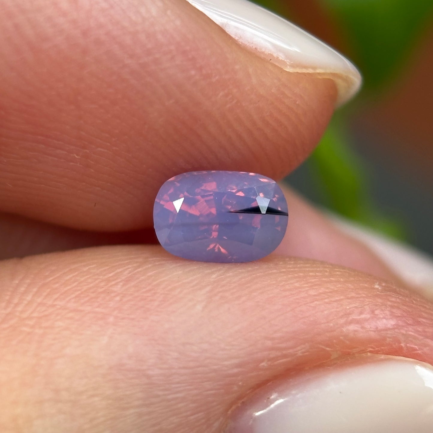 0.66 ct Natural Pinkish Purple Milky Sapphire Vietnam. Cushion Shape. No Treatment.