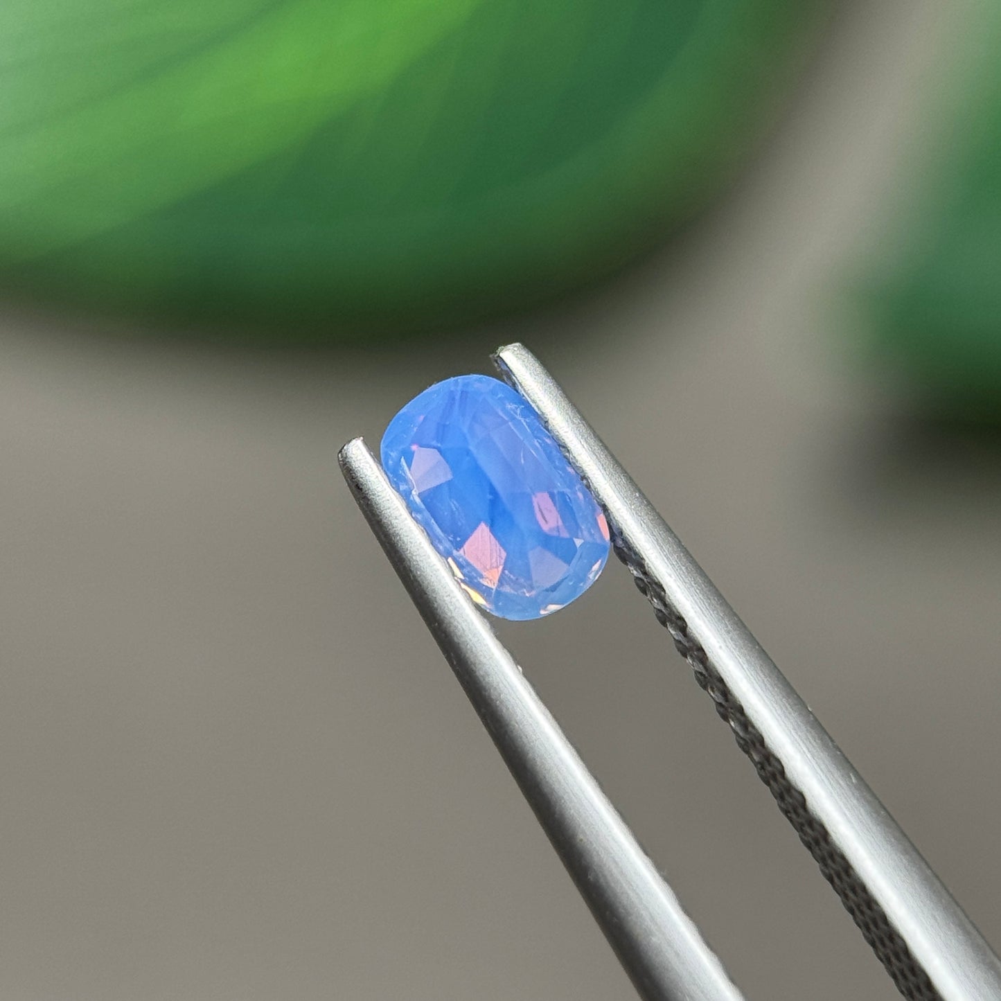 0.62ct Natural Purplish Blue Milky Sapphire Vietnam. Cushion Shape. No Treatment.