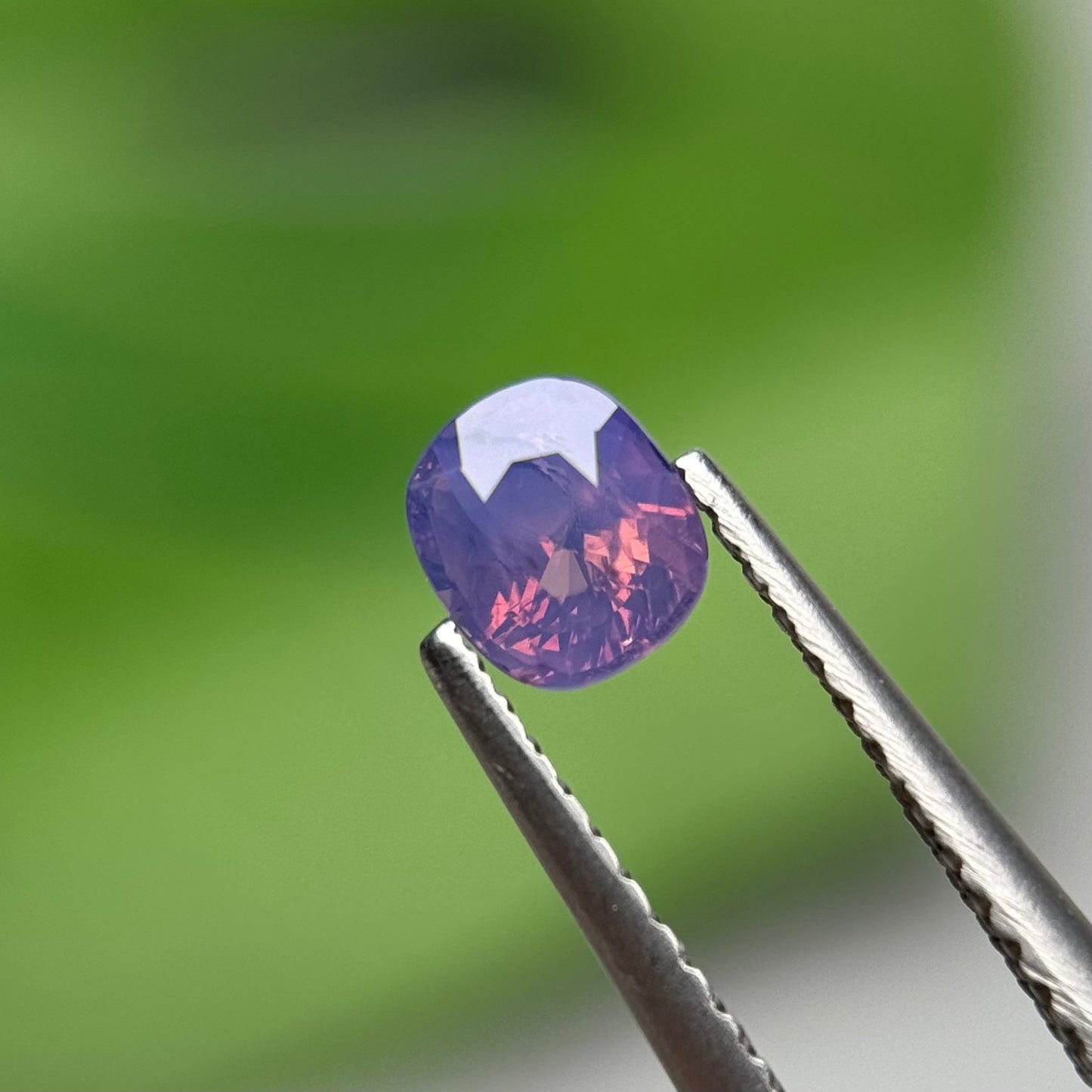0.65 ct Natural Pinkish Purple Milky Sapphire Vietnam. Cushion Shape. No Treatment.