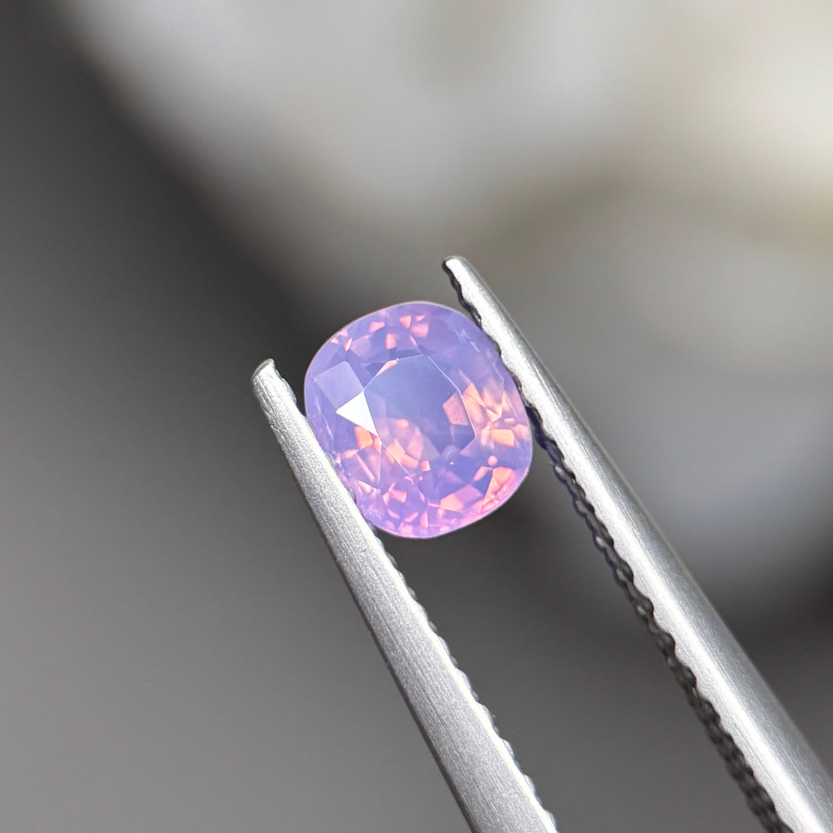 0,55ct Natural Pinkish Purple Milky Sapphire Vietnam. Cushion Shape. No Treatment Milky Sapphire Luc Yen.