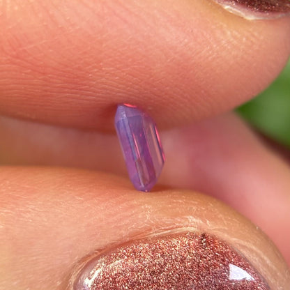 0.55 ct Natural Pinkish Purple Milky Sapphire Vietnam. Emerald Shape. No Treatment.