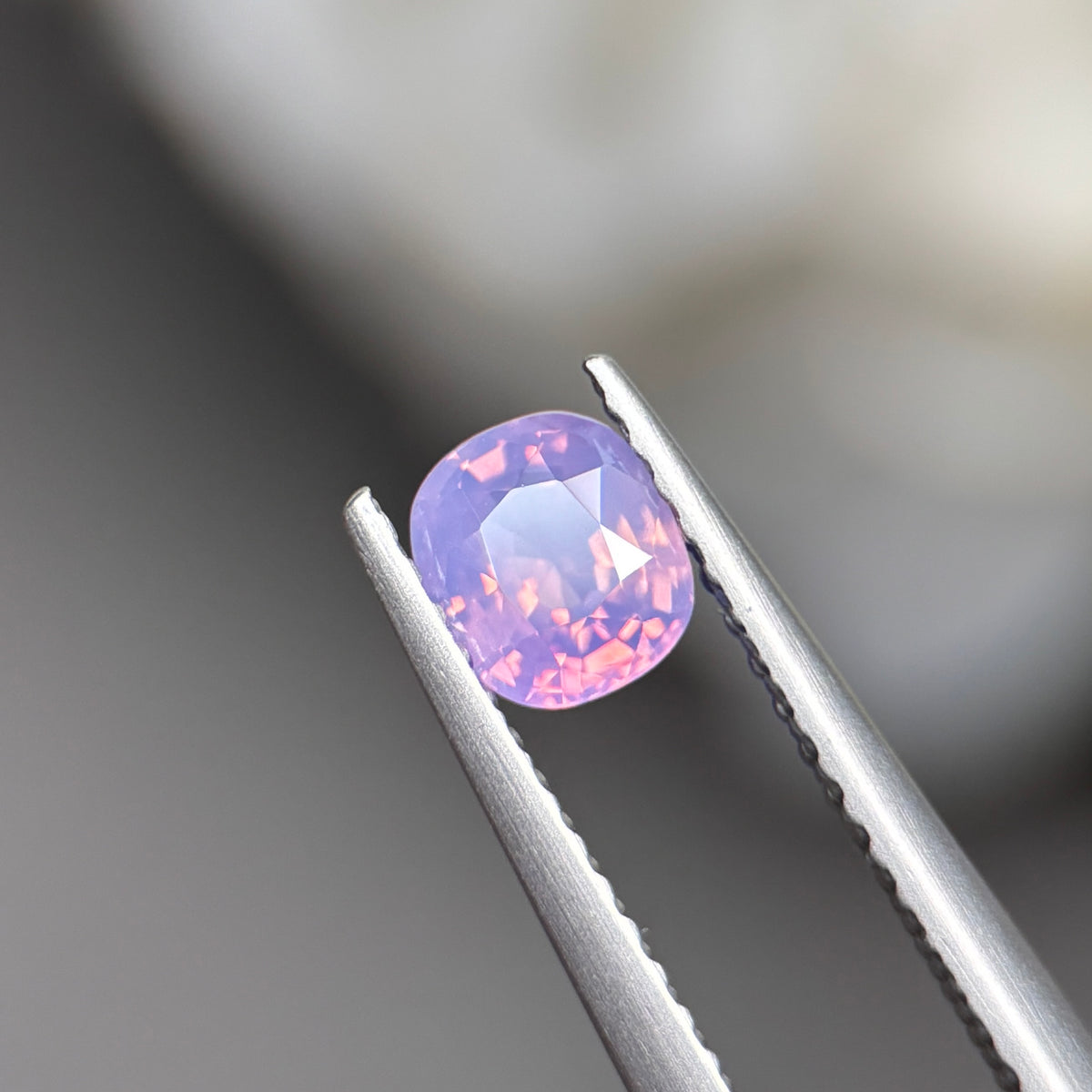 0,55ct Natural Pinkish Purple Milky Sapphire Vietnam. Cushion Shape. No Treatment Milky Sapphire Luc Yen.