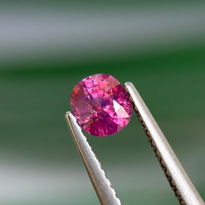 0.59 ct Natural Prurplish Pink Sapphire Vietnam. Cushion Shape. No Treatment.