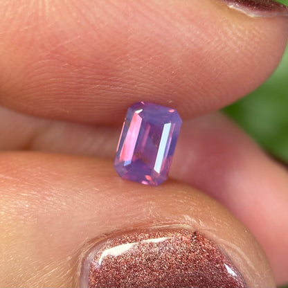 0.55 ct Natural Pinkish Purple Milky Sapphire Vietnam. Emerald Shape. No Treatment.