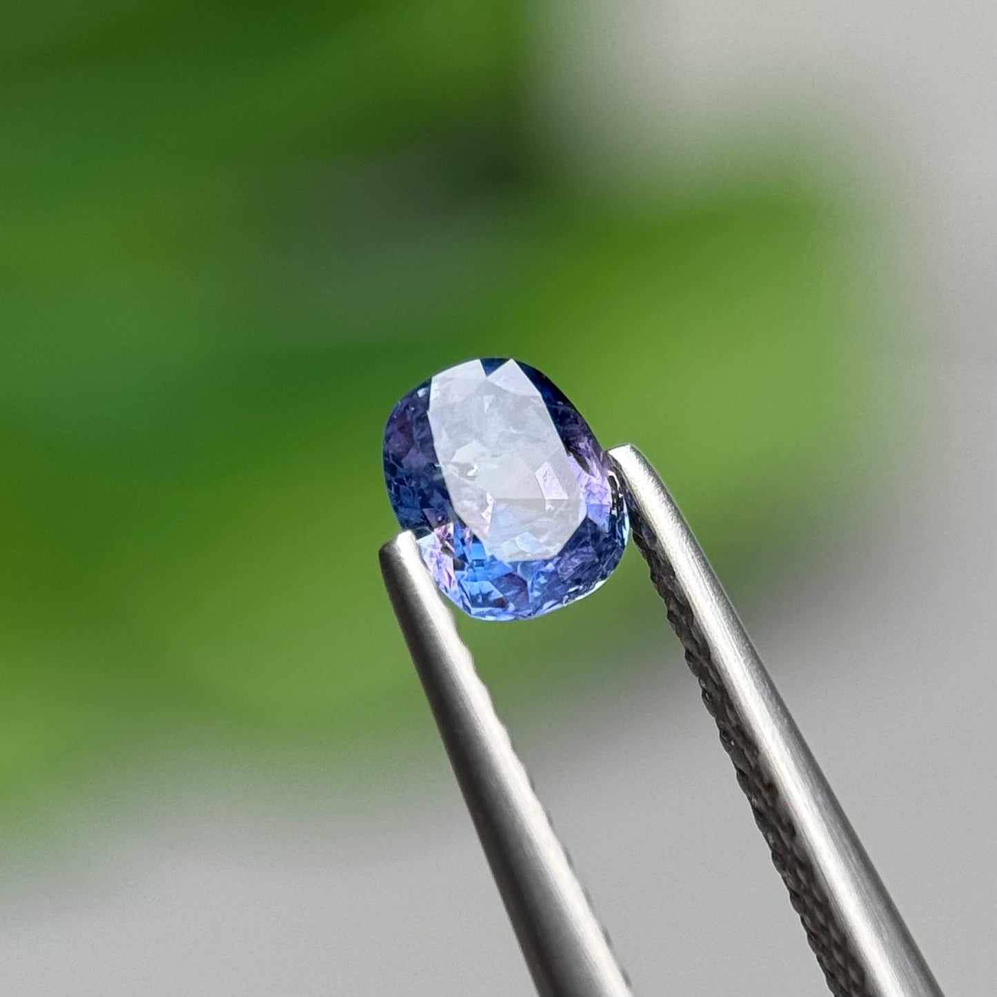0.57 ct Natural Purplish Blue Milky Sapphire Vietnam. Cushion Shape. No Treatment.