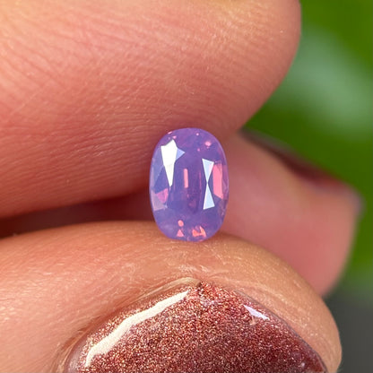 0.50 ct Natural Pinkish Purple Milky Sapphire Vietnam. Oval Shape. No Treatment.