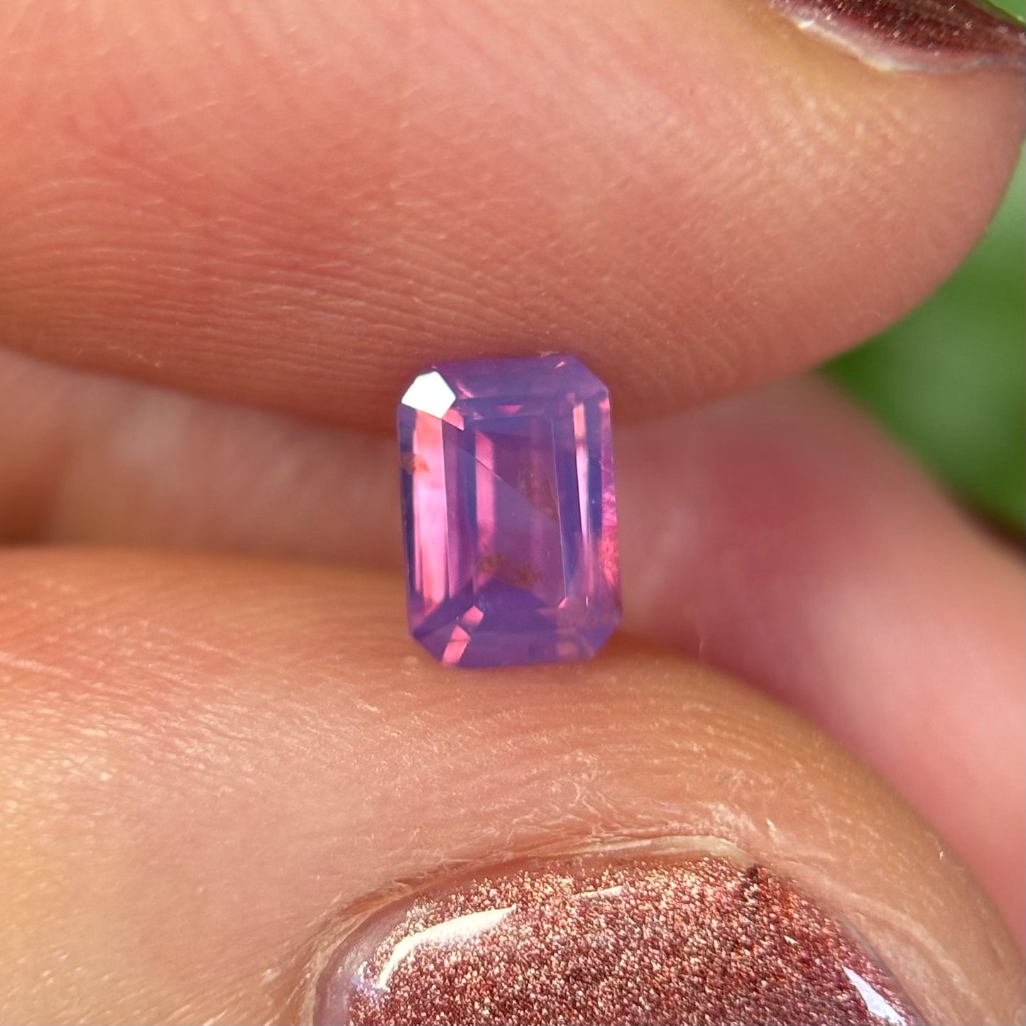 0.55 ct Natural Pinkish Purple Milky Sapphire Vietnam. Emerald Shape. No Treatment.