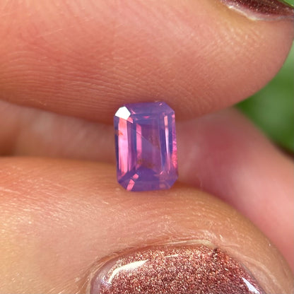 0.55 ct Natural Pinkish Purple Milky Sapphire Vietnam. Emerald Shape. No Treatment.