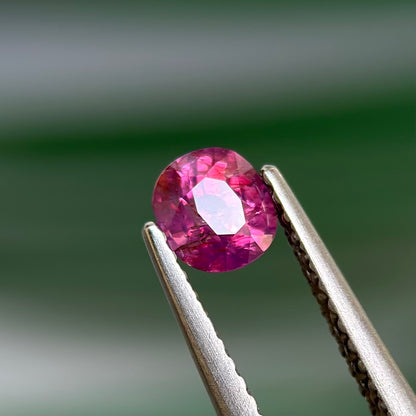 0.59 ct Natural Prurplish Pink Sapphire Vietnam. Cushion Shape. No Treatment.