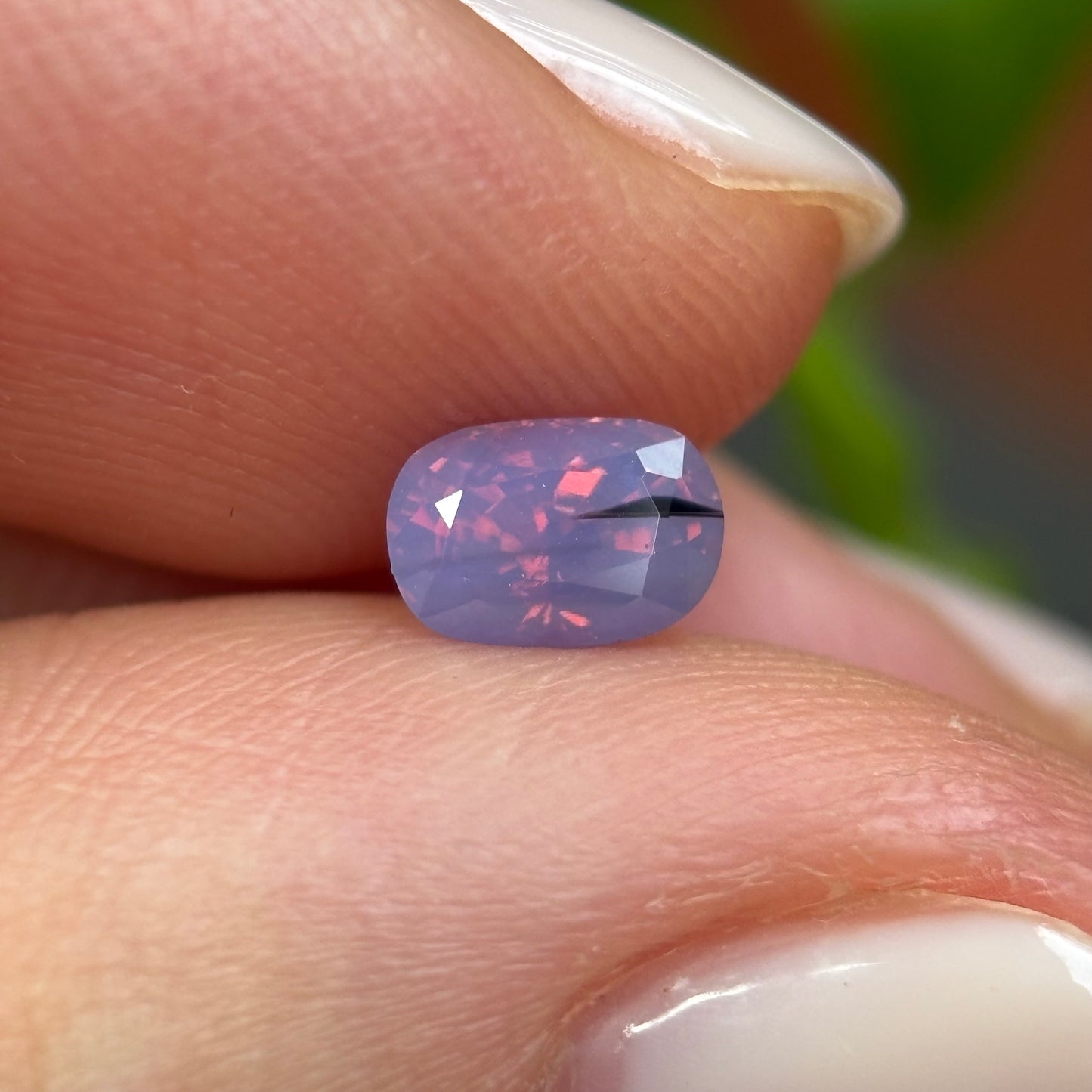 0.66 ct Natural Pinkish Purple Milky Sapphire Vietnam. Cushion Shape. No Treatment.