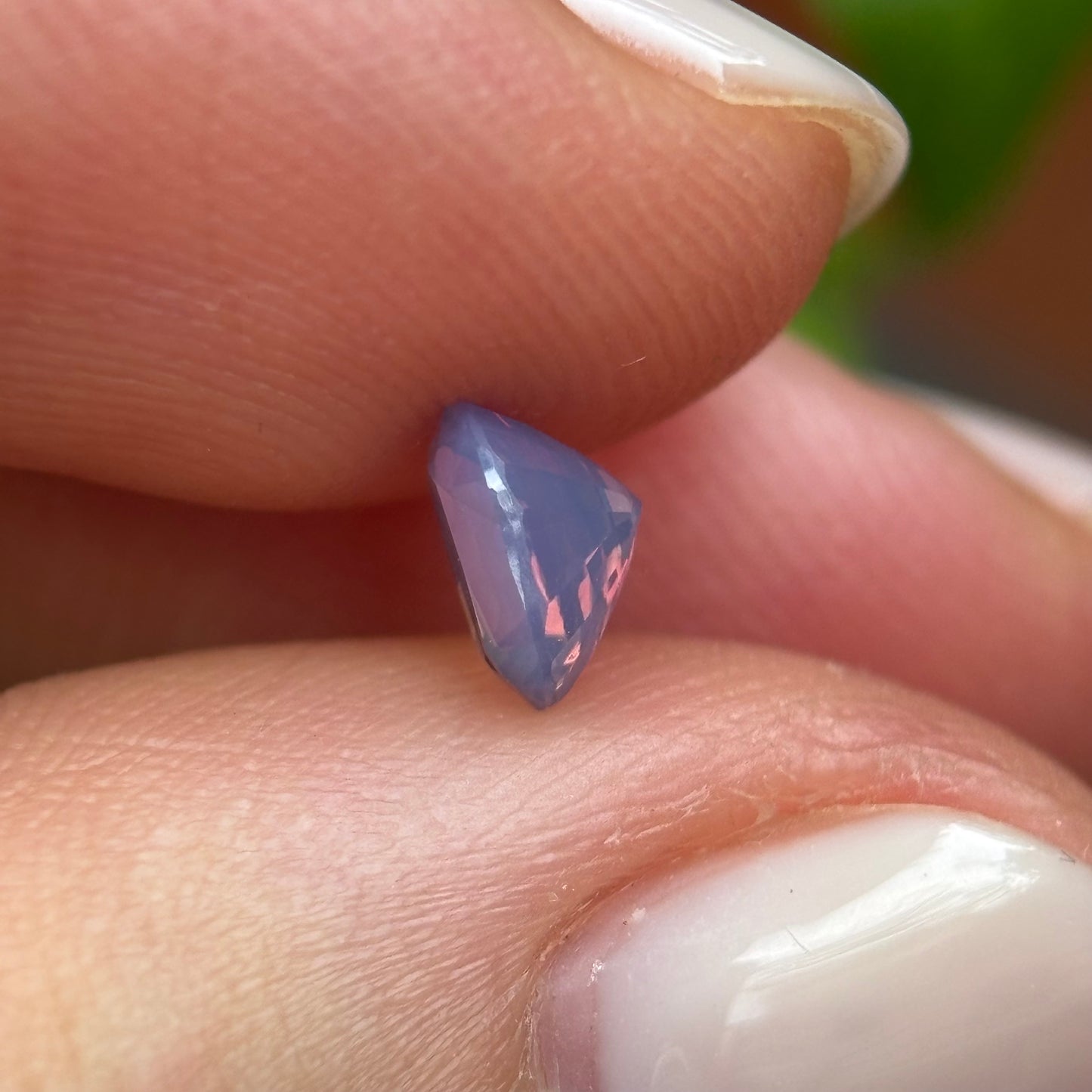 0.66 ct Natural Pinkish Purple Milky Sapphire Vietnam. Cushion Shape. No Treatment.