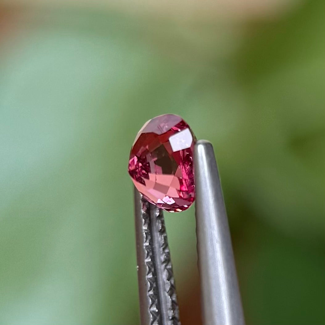 0.73ct Natural Pink-Orange Spinel Vietnam. Cushion Shape.