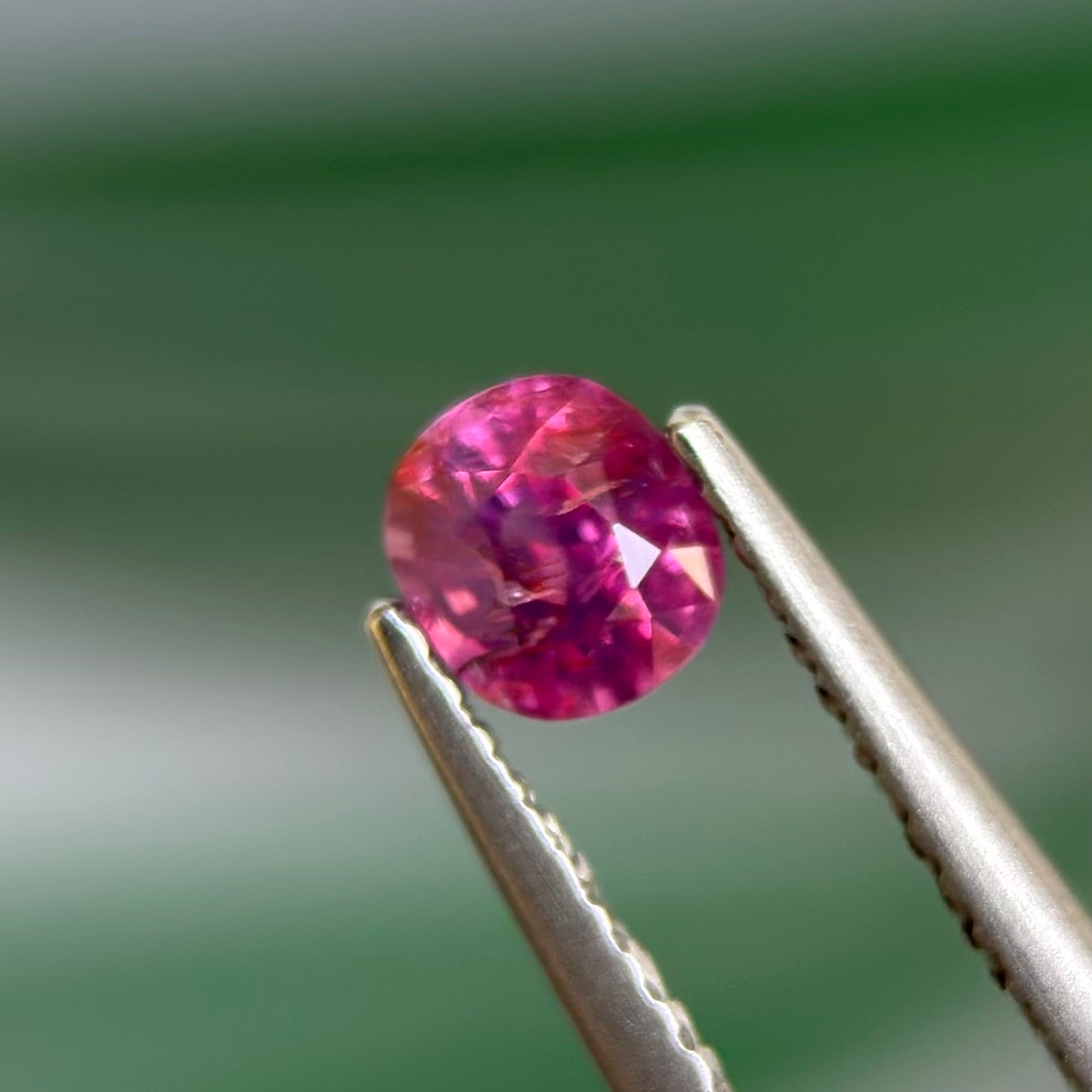 0.59 ct Natural Prurplish Pink Sapphire Vietnam. Cushion Shape. No Treatment.