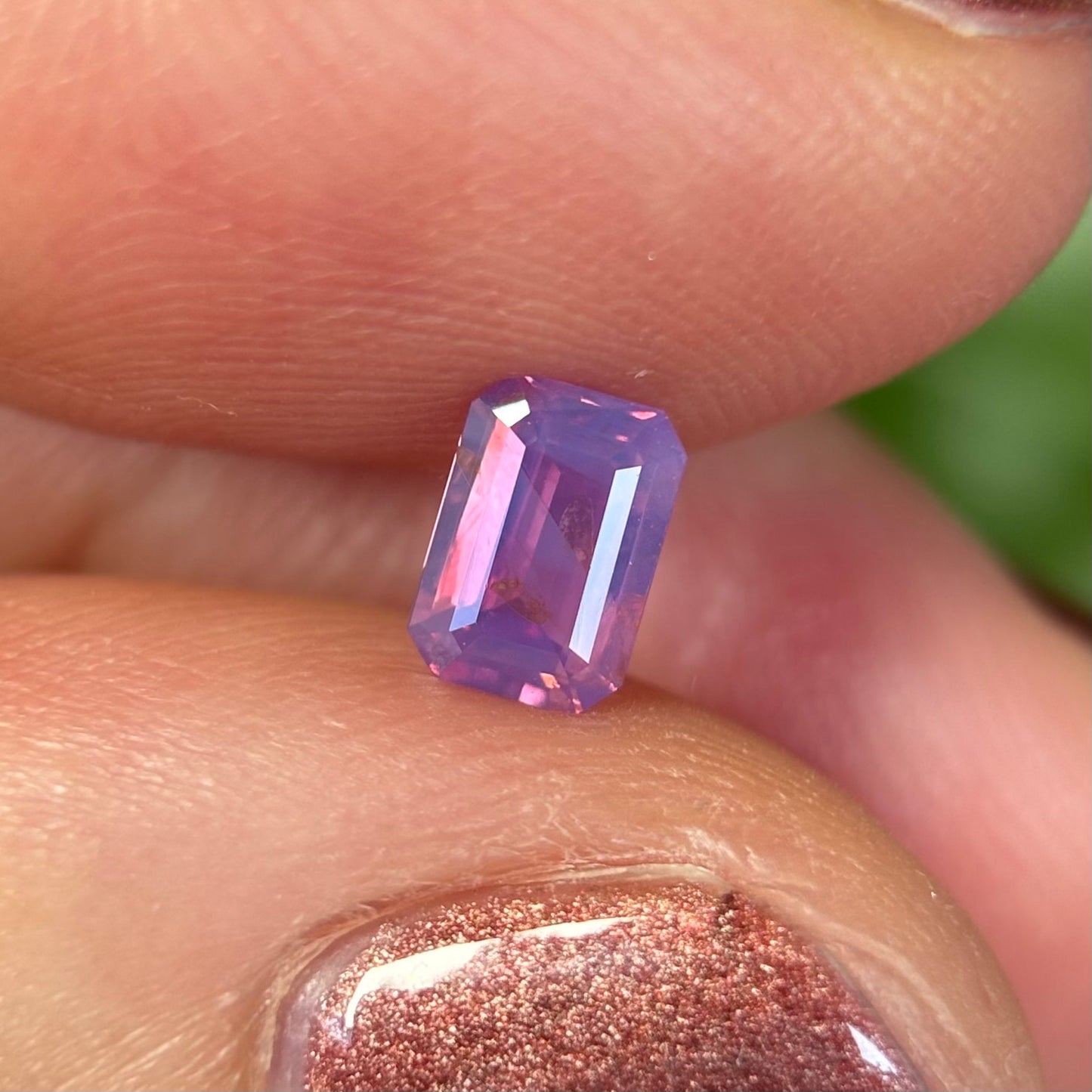 0.55 ct Natural Pinkish Purple Milky Sapphire Vietnam. Emerald Shape. No Treatment.