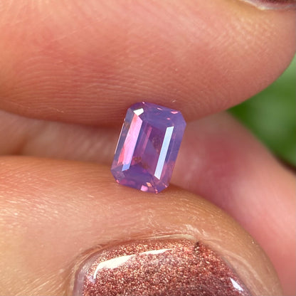 0.55 ct Natural Pinkish Purple Milky Sapphire Vietnam. Emerald Shape. No Treatment.